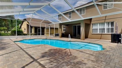 Spacious 4 Bedroom, 3.5 Bathroom heated pool home located in the on Hernando Oaks Golf and Country Club in Florida - for sale on GolfHomes.com, golf home, golf lot