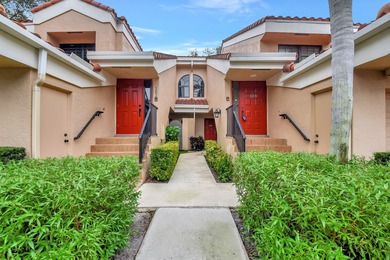 Perfectly located first floor condo residence with long views of on Bocaire Country Club in Florida - for sale on GolfHomes.com, golf home, golf lot