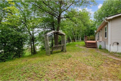 Turn the key and start enjoying lake life from this fully on Hardwoods Golf Club At Mille Lacs in Minnesota - for sale on GolfHomes.com, golf home, golf lot
