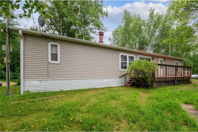 Turn the key and start enjoying lake life from this fully on Hardwoods Golf Club At Mille Lacs in Minnesota - for sale on GolfHomes.com, golf home, golf lot