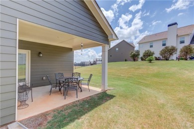 Located in the highly sought-after Traditions of Braselton, this on Traditions of Braselton Golf Club in Georgia - for sale on GolfHomes.com, golf home, golf lot