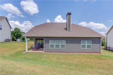 Located in the highly sought-after Traditions of Braselton, this on Traditions of Braselton Golf Club in Georgia - for sale on GolfHomes.com, golf home, golf lot
