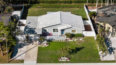 Stunning Belleair home nestled with a view of the 16th Fairway on Belleview Biltmore Golf Club in Florida - for sale on GolfHomes.com, golf home, golf lot