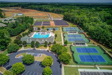 Located in the highly sought-after Traditions of Braselton, this on Traditions of Braselton Golf Club in Georgia - for sale on GolfHomes.com, golf home, golf lot