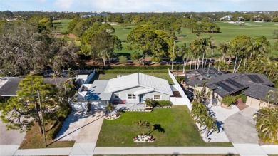 Stunning Belleair home nestled with a view of the 16th Fairway on Belleview Biltmore Golf Club in Florida - for sale on GolfHomes.com, golf home, golf lot