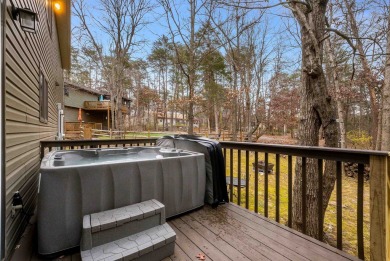 Cozy, contemporary, and full of charm--this mountain home in on Woodstone Meadows Golf Course At Massanutten in Virginia - for sale on GolfHomes.com, golf home, golf lot