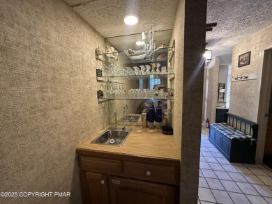 Welcome to 844 Crest Pine Lane - a charming 3-bedroom, 2.5 bath on Pinecrest Lake Golf and Country Club in Pennsylvania - for sale on GolfHomes.com, golf home, golf lot