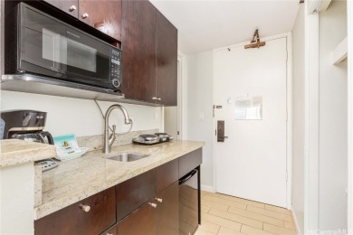 Legal vacation rental unit at the Island Colony, in the heart of on Ala Wai Golf Course in Hawaii - for sale on GolfHomes.com, golf home, golf lot