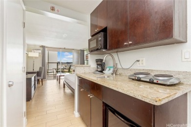 Legal vacation rental unit at the Island Colony, in the heart of on Ala Wai Golf Course in Hawaii - for sale on GolfHomes.com, golf home, golf lot