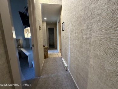 Welcome to 844 Crest Pine Lane - a charming 3-bedroom, 2.5 bath on Pinecrest Lake Golf and Country Club in Pennsylvania - for sale on GolfHomes.com, golf home, golf lot