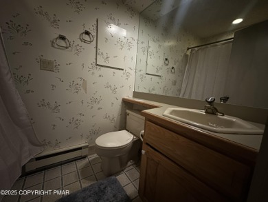 Welcome to 844 Crest Pine Lane - a charming 3-bedroom, 2.5 bath on Pinecrest Lake Golf and Country Club in Pennsylvania - for sale on GolfHomes.com, golf home, golf lot