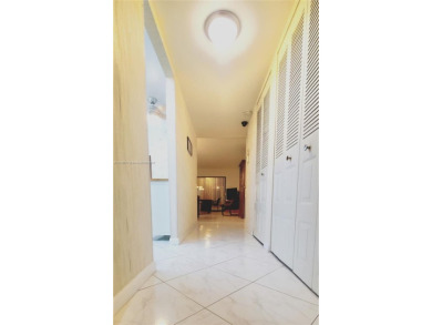 MUST SEE! Beautifully UPDATED 3rd FLOOR 2/2 PENTHOUSE condo in on Sunrise Lakes Phase IV Golf Course in Florida - for sale on GolfHomes.com, golf home, golf lot