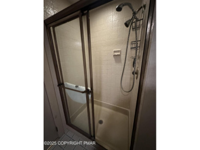 Welcome to 844 Crest Pine Lane - a charming 3-bedroom, 2.5 bath on Pinecrest Lake Golf and Country Club in Pennsylvania - for sale on GolfHomes.com, golf home, golf lot