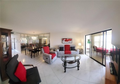 MUST SEE! Beautifully UPDATED 3rd FLOOR 2/2 PENTHOUSE condo in on Sunrise Lakes Phase IV Golf Course in Florida - for sale on GolfHomes.com, golf home, golf lot