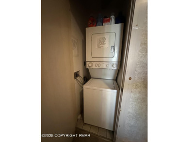 Welcome to 844 Crest Pine Lane - a charming 3-bedroom, 2.5 bath on Pinecrest Lake Golf and Country Club in Pennsylvania - for sale on GolfHomes.com, golf home, golf lot