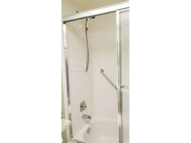MUST SEE! Beautifully UPDATED 3rd FLOOR 2/2 PENTHOUSE condo in on Sunrise Lakes Phase IV Golf Course in Florida - for sale on GolfHomes.com, golf home, golf lot