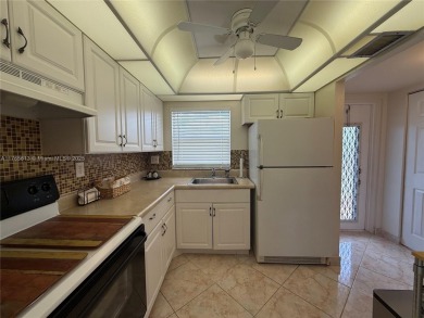 Wonderful well kept condo fully furnished and move in ready on Sunrise Lakes Phase III in Florida - for sale on GolfHomes.com, golf home, golf lot
