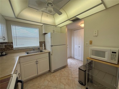 Wonderful well kept condo fully furnished and move in ready on Sunrise Lakes Phase III in Florida - for sale on GolfHomes.com, golf home, golf lot