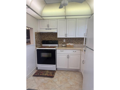 Wonderful well kept condo fully furnished and move in ready on Sunrise Lakes Phase III in Florida - for sale on GolfHomes.com, golf home, golf lot