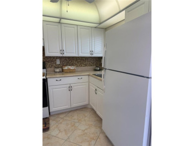 Wonderful well kept condo fully furnished and move in ready on Sunrise Lakes Phase III in Florida - for sale on GolfHomes.com, golf home, golf lot