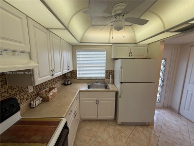 Wonderful well kept condo fully furnished and move in ready on Sunrise Lakes Phase III in Florida - for sale on GolfHomes.com, golf home, golf lot