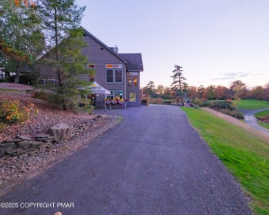 Welcome to 844 Crest Pine Lane - a charming 3-bedroom, 2.5 bath on Pinecrest Lake Golf and Country Club in Pennsylvania - for sale on GolfHomes.com, golf home, golf lot