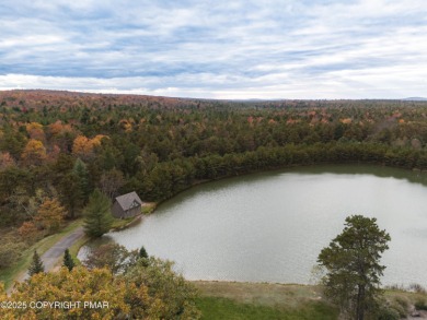 Welcome to 844 Crest Pine Lane - a charming 3-bedroom, 2.5 bath on Pinecrest Lake Golf and Country Club in Pennsylvania - for sale on GolfHomes.com, golf home, golf lot