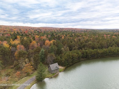 Welcome to 844 Crest Pine Lane - a charming 3-bedroom, 2.5 bath on Pinecrest Lake Golf and Country Club in Pennsylvania - for sale on GolfHomes.com, golf home, golf lot