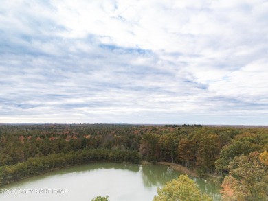 Welcome to 844 Crest Pine Lane - a charming 3-bedroom, 2.5 bath on Pinecrest Lake Golf and Country Club in Pennsylvania - for sale on GolfHomes.com, golf home, golf lot