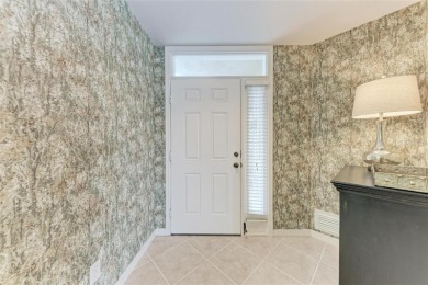 Experience luxurious living with unparalleled views! Step into on Plantation Golf and Country Club in Florida - for sale on GolfHomes.com, golf home, golf lot