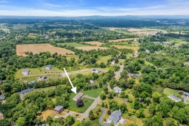 Cyclist will love rolling right out of your driveway and into on Neshanic Valley Golf Course  in New Jersey - for sale on GolfHomes.com, golf home, golf lot