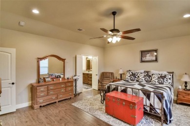 Welcome to this charming 4-bedroom, 2-bath home nestled within on Harbor Lakes Golf Club in Texas - for sale on GolfHomes.com, golf home, golf lot