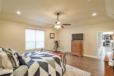 Welcome to this charming 4-bedroom, 2-bath home nestled within on Harbor Lakes Golf Club in Texas - for sale on GolfHomes.com, golf home, golf lot