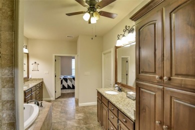 Welcome to this charming 4-bedroom, 2-bath home nestled within on Harbor Lakes Golf Club in Texas - for sale on GolfHomes.com, golf home, golf lot
