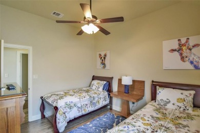 Welcome to this charming 4-bedroom, 2-bath home nestled within on Harbor Lakes Golf Club in Texas - for sale on GolfHomes.com, golf home, golf lot