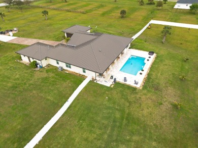 Beautiful almost new custom built home on 5 acre lot located in on Meadowood Golf and Tennis Club in Florida - for sale on GolfHomes.com, golf home, golf lot