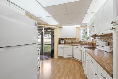 EASY TO MOVE-IN & LOVE! THIS CONVENIENTLY LOCATED FURNISHED on Poinciana Golf Club in Florida - for sale on GolfHomes.com, golf home, golf lot