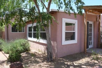 Charming North Campus location! This pueblo style  home has on North Course - University of New Mexico  in New Mexico - for sale on GolfHomes.com, golf home, golf lot