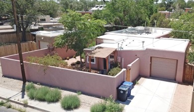 Charming North Campus location! This pueblo style  home has on North Course - University of New Mexico  in New Mexico - for sale on GolfHomes.com, golf home, golf lot