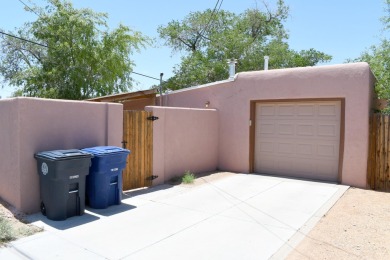 Charming North Campus location! This pueblo style  home has on North Course - University of New Mexico  in New Mexico - for sale on GolfHomes.com, golf home, golf lot