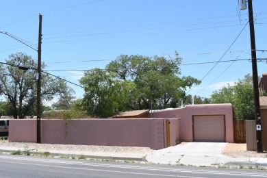 Charming North Campus location! This pueblo style  home has on North Course - University of New Mexico  in New Mexico - for sale on GolfHomes.com, golf home, golf lot