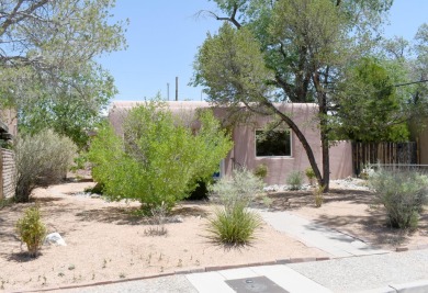 Charming North Campus location! This pueblo style  home has on North Course - University of New Mexico  in New Mexico - for sale on GolfHomes.com, golf home, golf lot