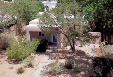 Charming North Campus location! This pueblo style  home has on North Course - University of New Mexico  in New Mexico - for sale on GolfHomes.com, golf home, golf lot