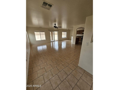 This oversized lot comes with a spacious 4-bedroom 3-bath home on Sundance Golf Club in Arizona - for sale on GolfHomes.com, golf home, golf lot