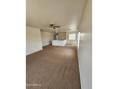 This oversized lot comes with a spacious 4-bedroom 3-bath home on Sundance Golf Club in Arizona - for sale on GolfHomes.com, golf home, golf lot