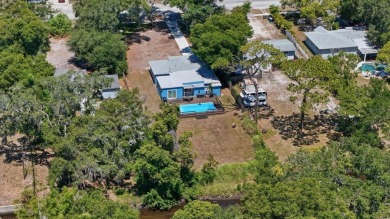 This home qualifies for community lending, which allows between on Clearwater Country Club in Florida - for sale on GolfHomes.com, golf home, golf lot