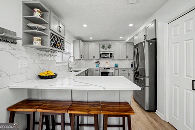 Your search is over! This completely updated home in the on Braelinn Golf Club in Georgia - for sale on GolfHomes.com, golf home, golf lot