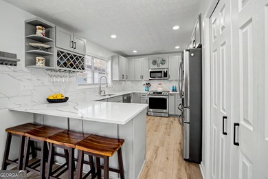 Your search is over! This completely updated home in the on Braelinn Golf Club in Georgia - for sale on GolfHomes.com, golf home, golf lot