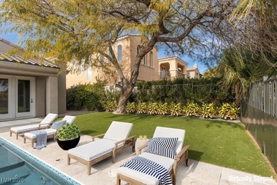 Set behind the gates of Red Rock Country Club, this luxury on Red Rock Country Club in Nevada - for sale on GolfHomes.com, golf home, golf lot