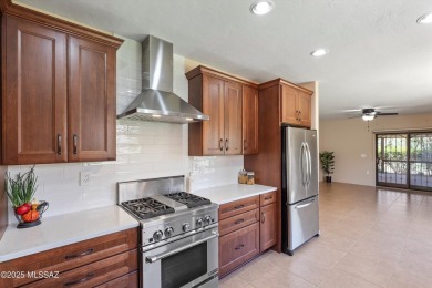 This remodeled, Oro Valley, 4 bedroom, 2 bath, home located in on El Conquistador Country Club - Conquistador in Arizona - for sale on GolfHomes.com, golf home, golf lot